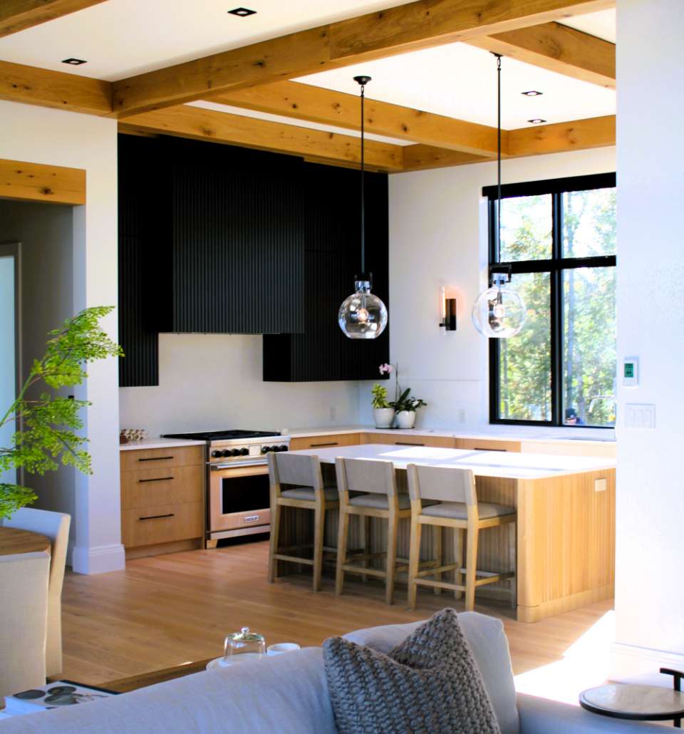 Modern kitchen with wood and black cabinets designed by an Ottawa kitchen cabinet manufacturer.